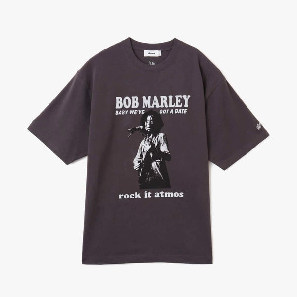 Special edition T-shirt celebrating Bob Marley’s biopic "Bob Marley: ONE LOVE," featuring a two-tone graphic inspired by the album Catch a Fire, atmos tag, ZION ROOTSWEAR logo, and Bob Marley’s signature embroidered on the left sleeve.


