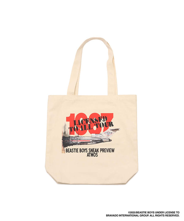 Limited edition atmos x Beastie Boys tote bag featuring "Licensed to Ill TOUR" flyer graphics and Eric Haze logo artwork, made from durable cotton material.