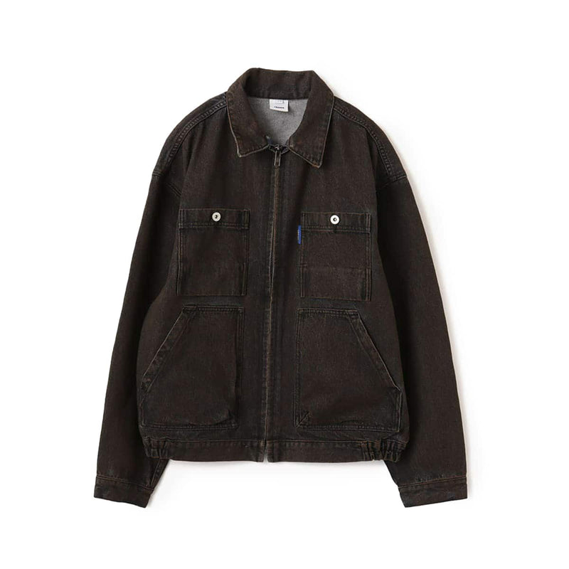 Boxy denim jacket with vintage wash, workwear details, and relaxed fit, styled with cargo pants.