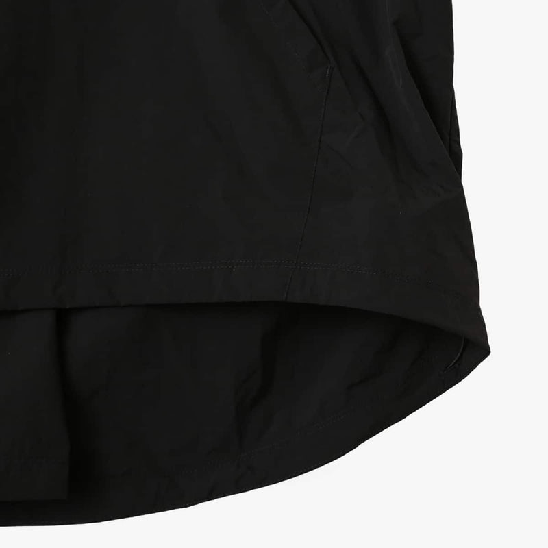 Lightweight, water-repellent anorak jacket with zippered back panel for wearing over a backpack