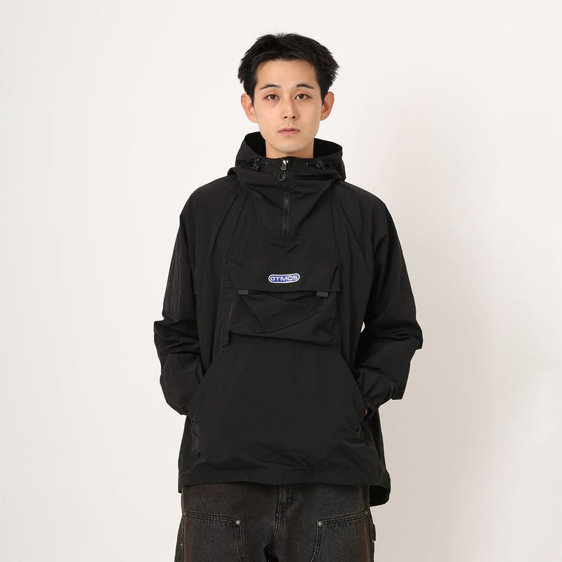 Lightweight, water-repellent anorak jacket with zippered back panel for wearing over a backpack