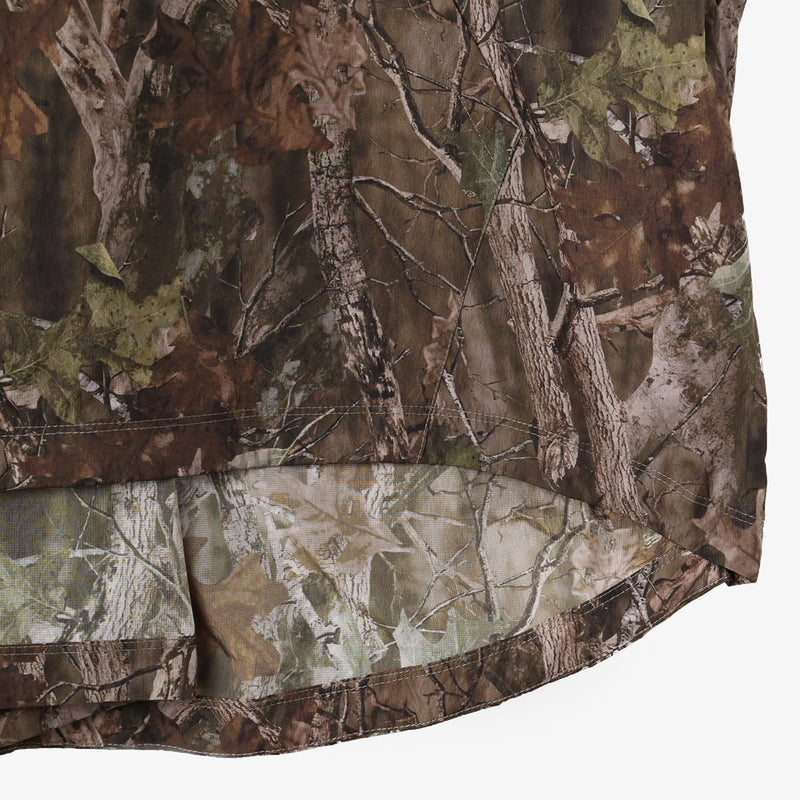 Lightweight, water-repellent anorak jacket with zippered back panel for wearing over a backpack