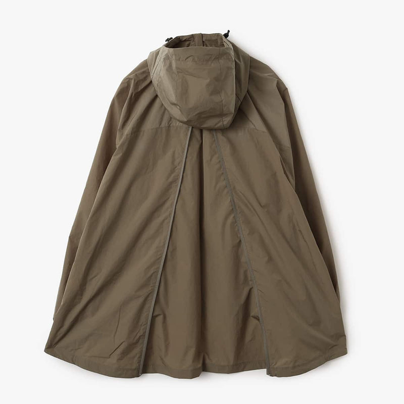 Lightweight, water-repellent anorak jacket with zippered back panel for wearing over a backpack