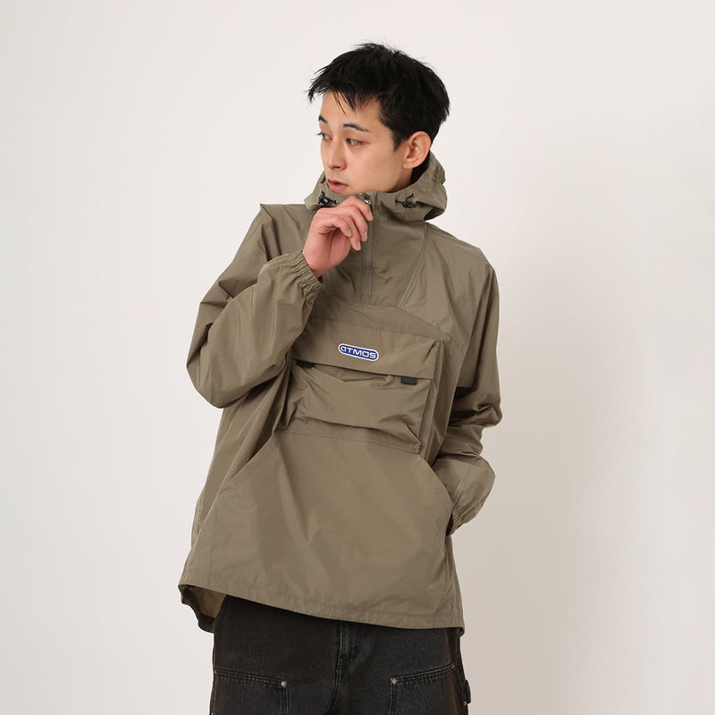 Lightweight, water-repellent anorak jacket with zippered back panel for wearing over a backpack