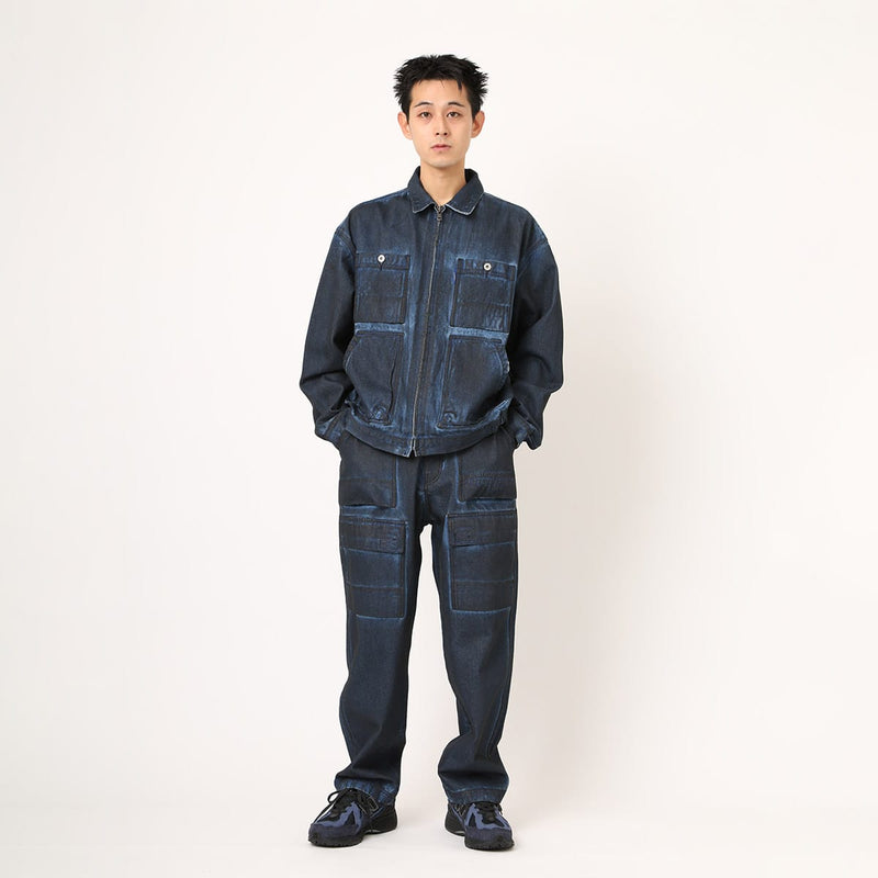 Vintage wash denim work pants with GI buckle waist, styled with matching denim jacket.