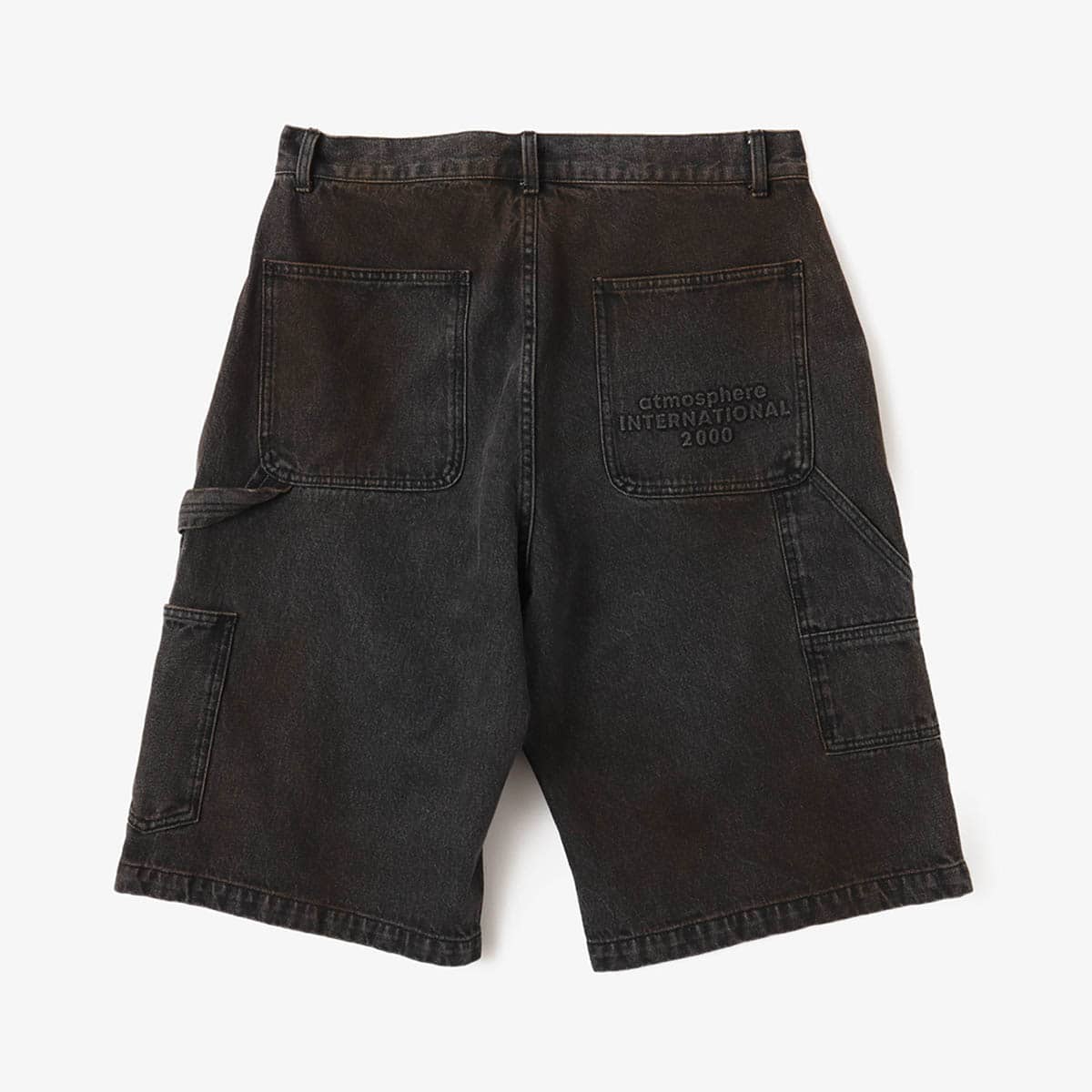Double knee denim shorts with vintage wash and heavyweight fabric, worn by model.