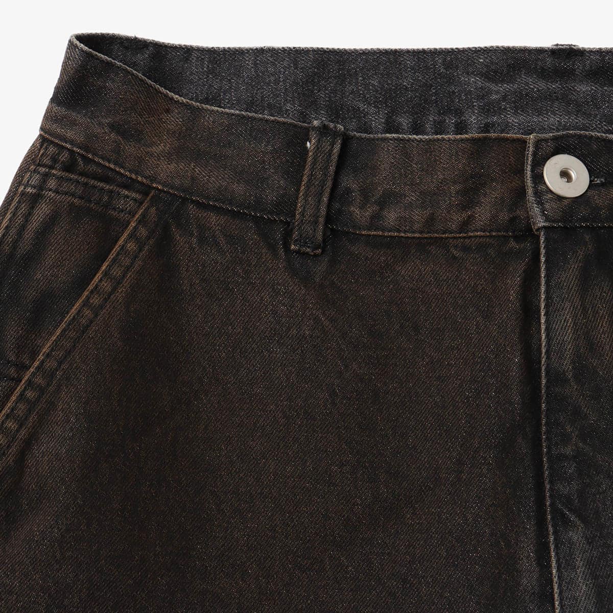 Double knee denim shorts with vintage wash and heavyweight fabric, worn by model.
