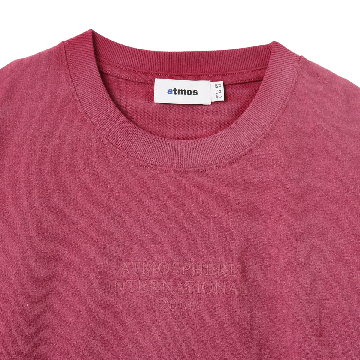 Monochrome T-shirt with tonal front embroidery and gradient rubber spray, worn by model 180cm tall in size L