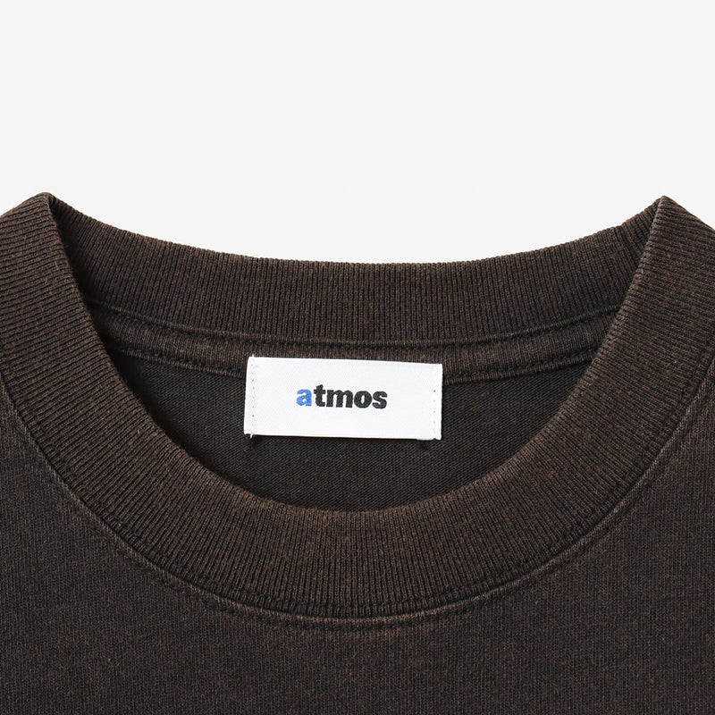 Short-sleeve T-shirt with front spray-style rubber graphic print in 100% cotton.