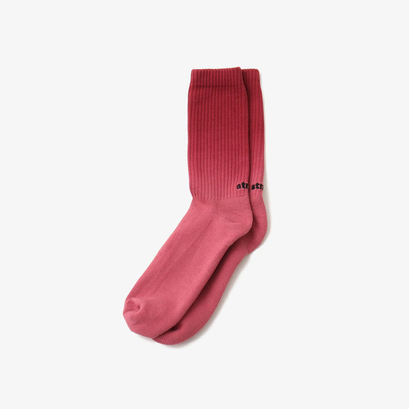 Hand-dyed gradient socks with atmos logo on heel and cushioned sole design.