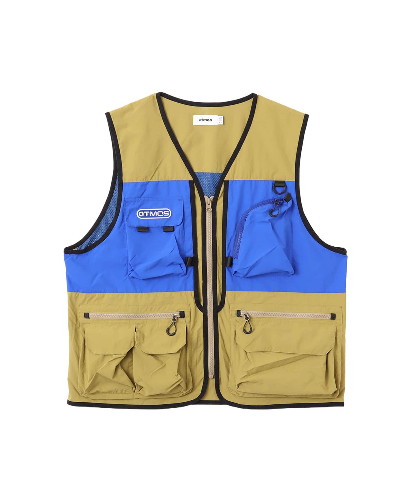 Model wearing a multi-pocket fishing-style vest made from textured nylon with a cotton-like finish.