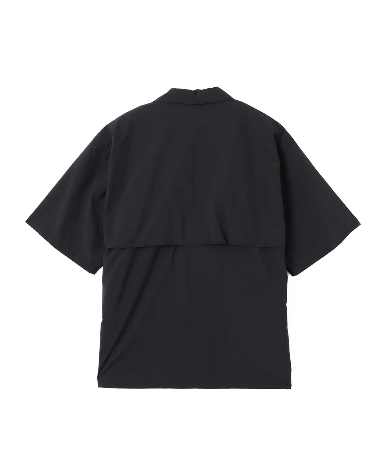 Model wearing a short-sleeved fishing-style nylon shirt with flap pocket and reflective atmos logo.