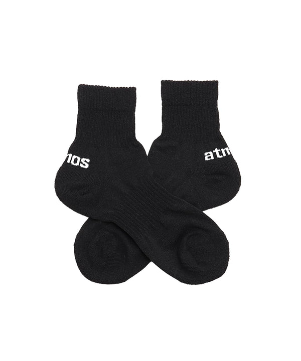 Breathable ankle socks in white, black, gray, and khaki with brand logo and cushioned heel and toe