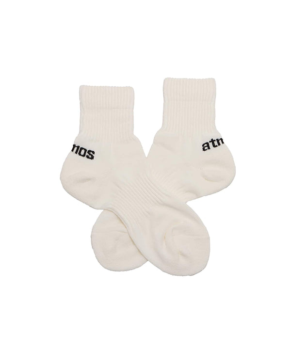 Breathable ankle socks in white, black, gray, and khaki with brand logo and cushioned heel and toe