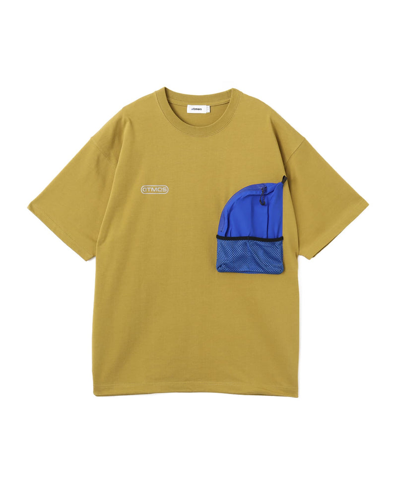 Model wearing a short-sleeved T-shirt with front zip pocket, made from textured, durable cotton.