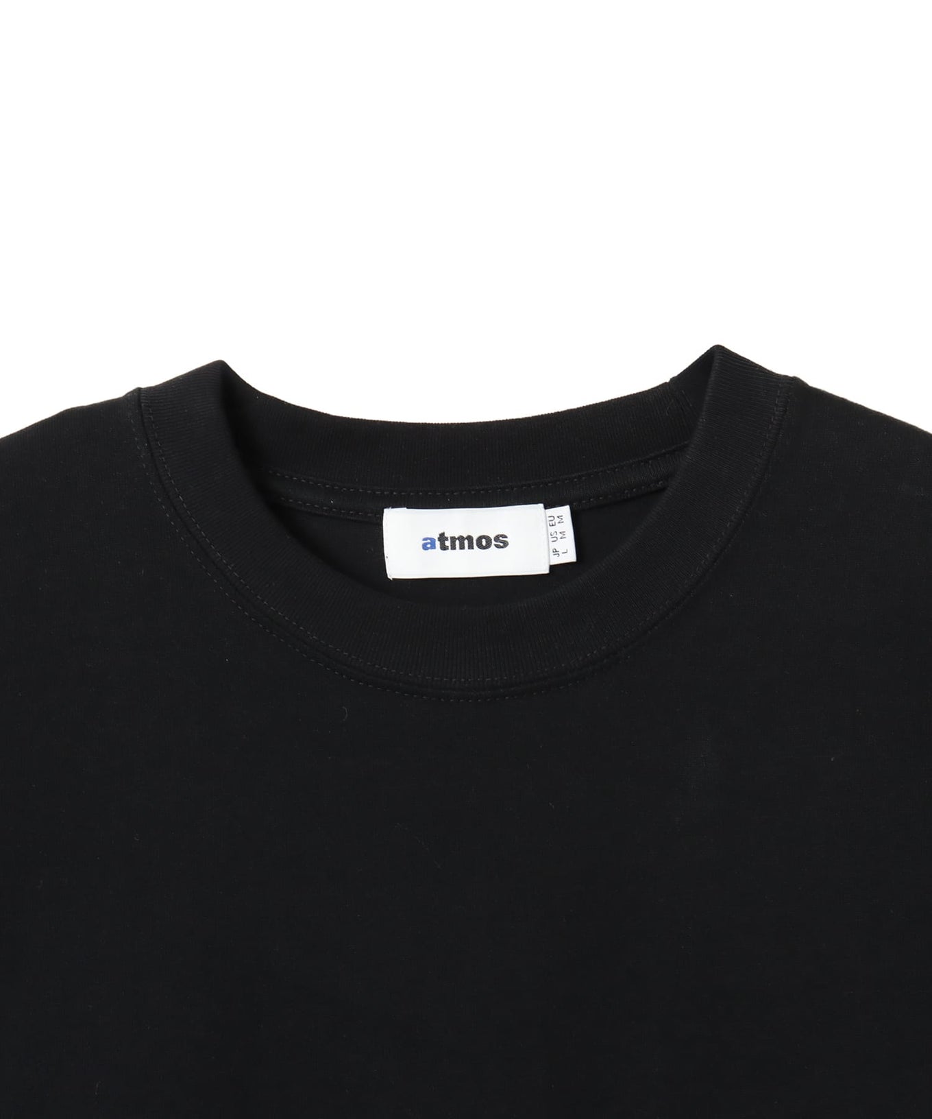 Model wearing a short-sleeved T-shirt with front zip pocket, made from textured, durable cotton.