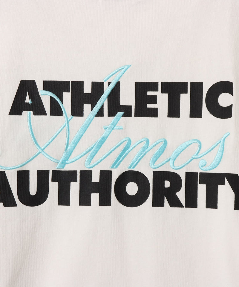 Model wearing short-sleeved atmos T-shirt with ATHENTIC AUTHORITY logo in embroidery and rubber print.