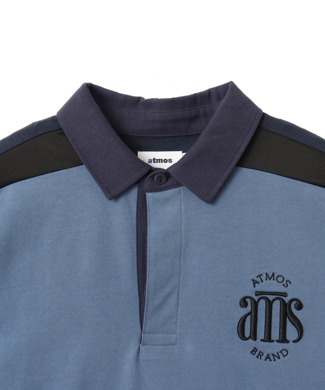 Color-block cotton rugby shirt with 3D embroidery on chest, styled in a relaxed fit