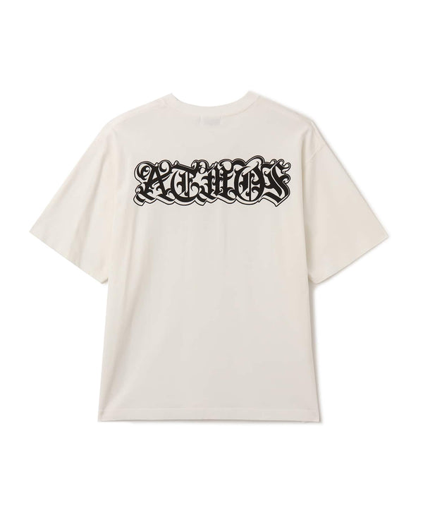 Black atmos T-shirt with Old English logo on front chest and back, styled with a vintage finish and worn by model.