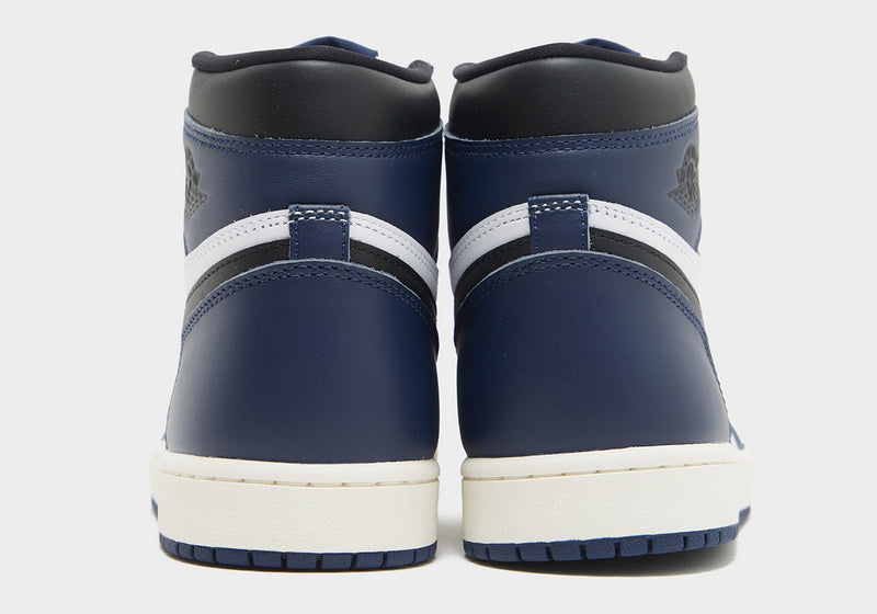 Midnight Navy leather sneaker with black accents, off-white midsole, and white tongue and panels.