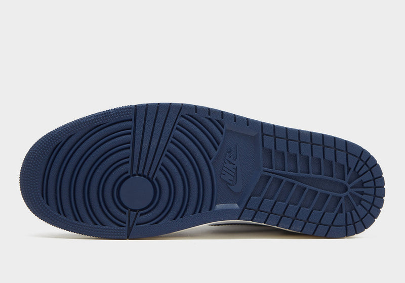 Midnight Navy leather sneaker with black accents, off-white midsole, and white tongue and panels.