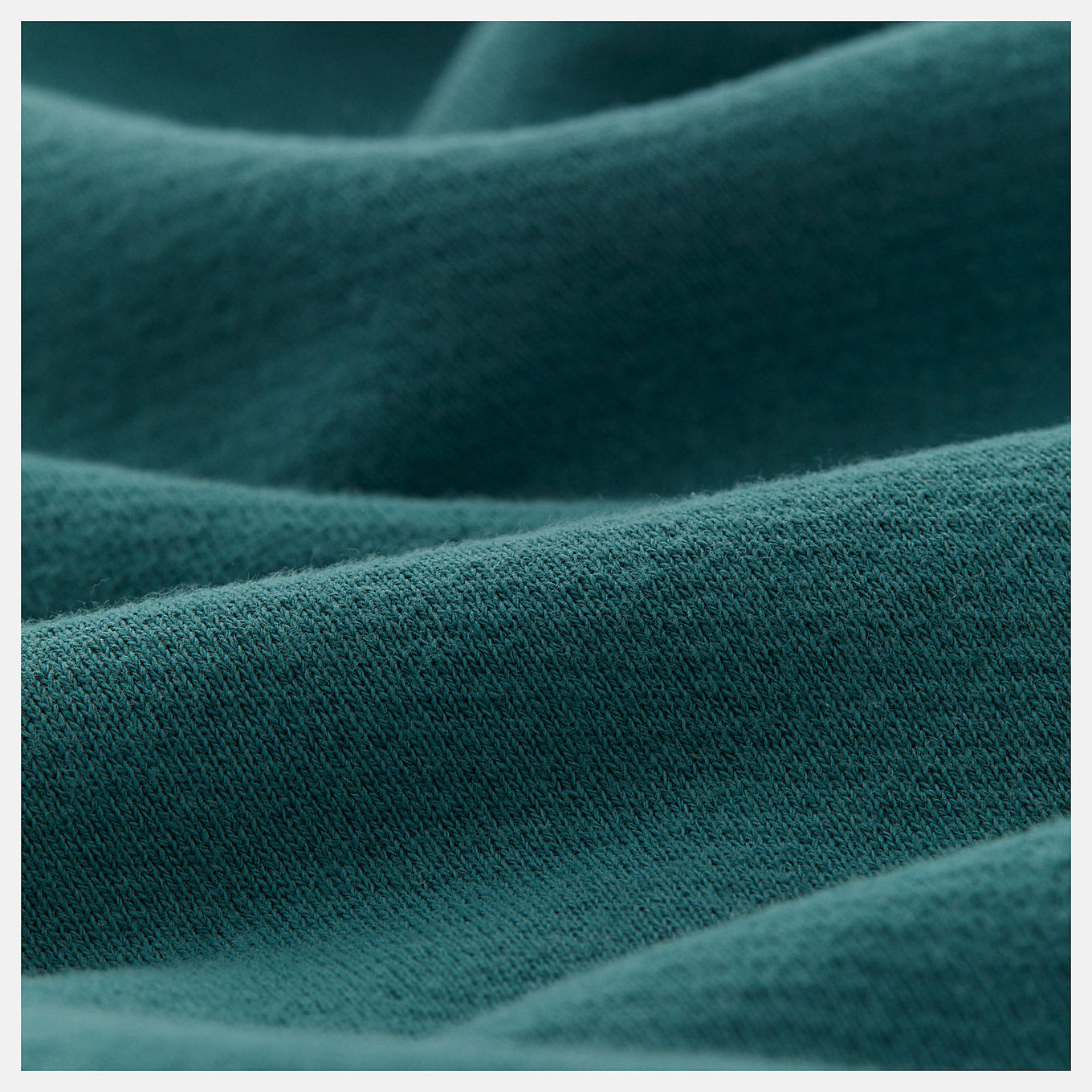 Made in USA Core Sweatpant in heavyweight French Terry, featuring a mid-rise cut, drawcord waistband, and embroidered patch logo, exemplifying timeless quality and craftsmanship.


