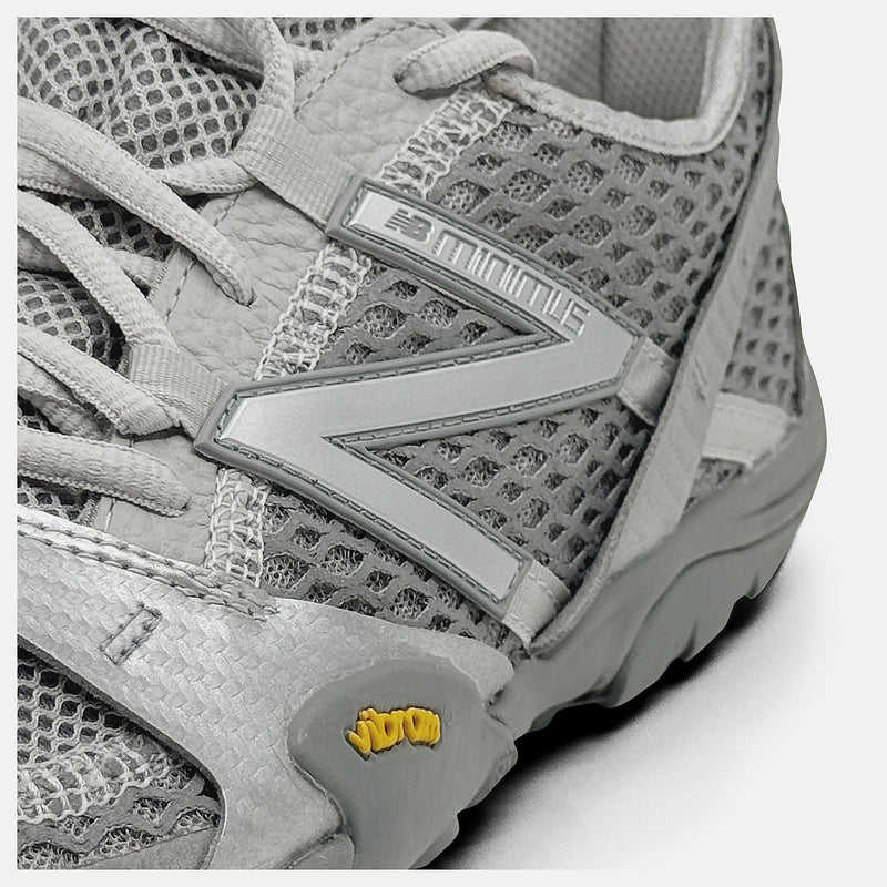 New Balance MT10 trail running shoe with lightweight build and rugged outsole for outdoor performance