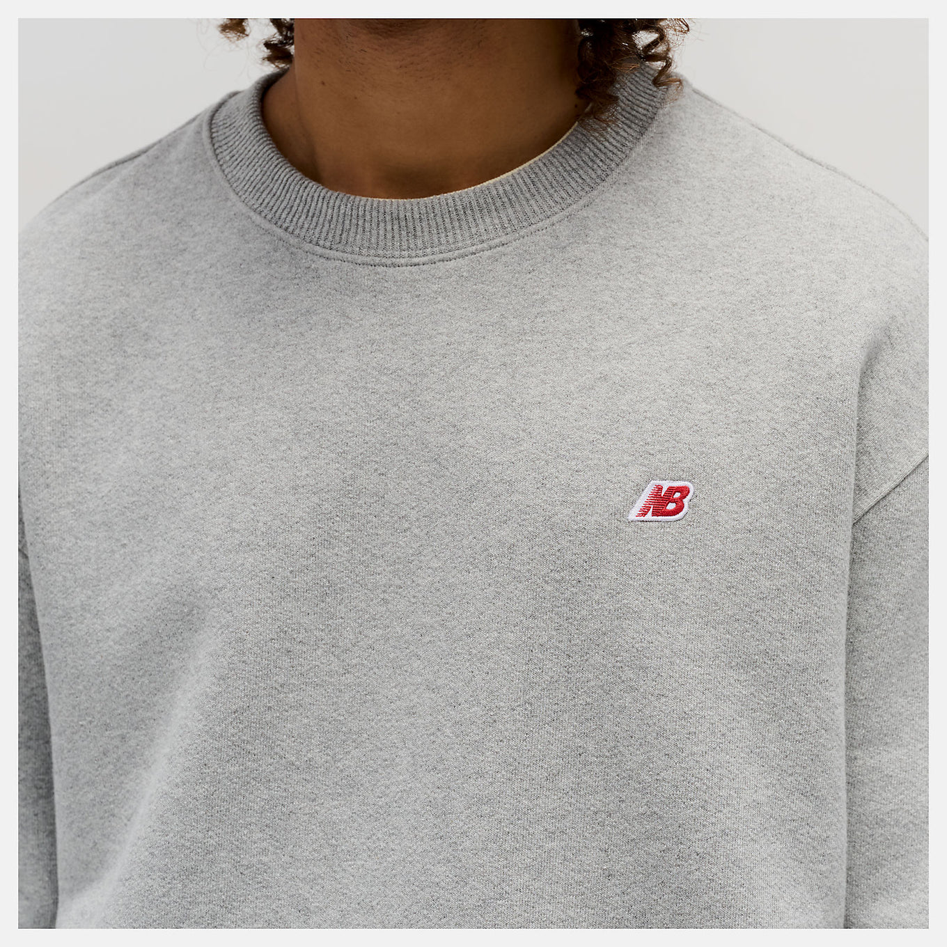 MADE in USA Crew sweatshirt made from heavyweight French terry with ribbed cuffs, hem, and embroidered patch logo.