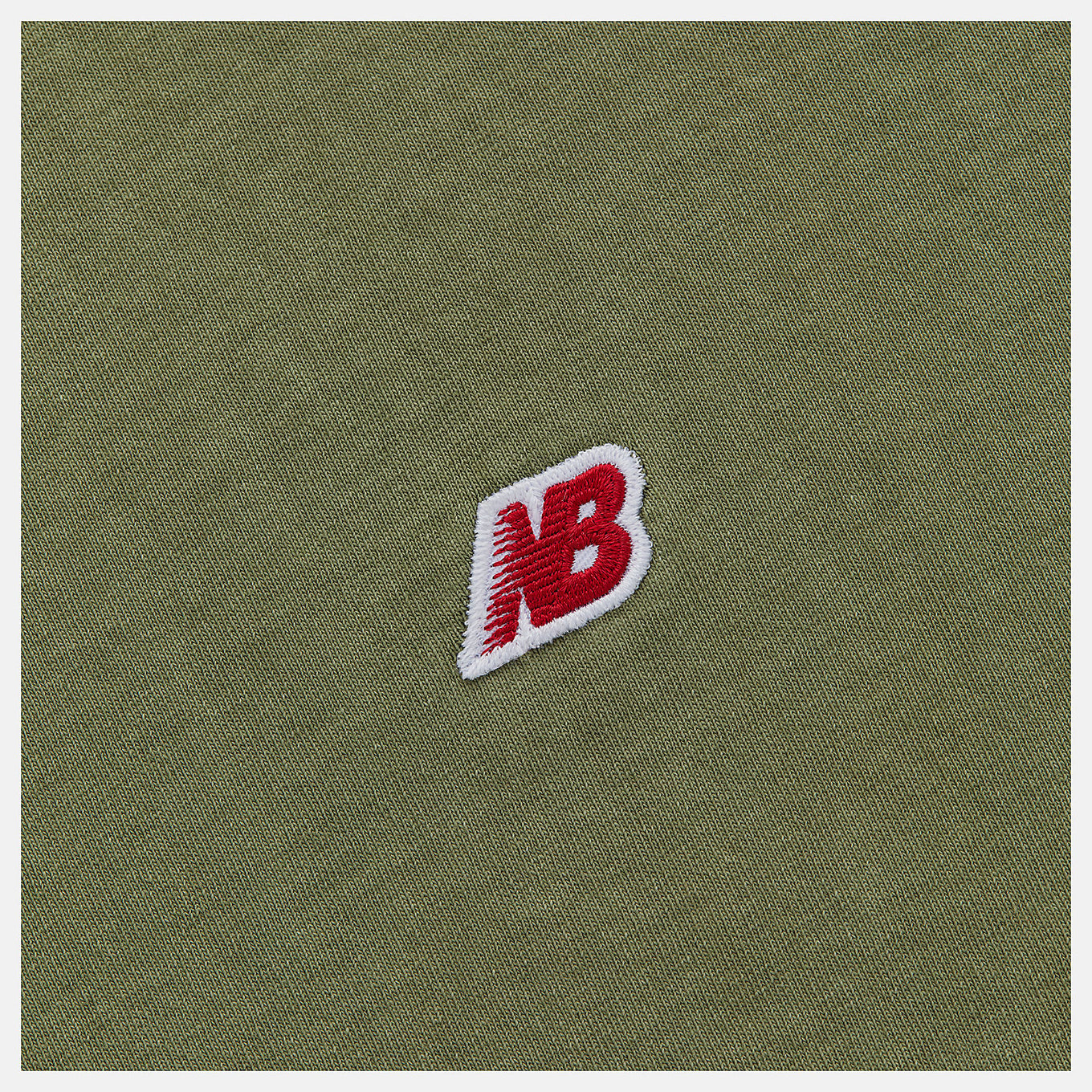 Made in USA Washed Short Sleeve T-Shirt with crew silhouette, embroidered patch logo, and vintage-inspired dyed wash treatment.