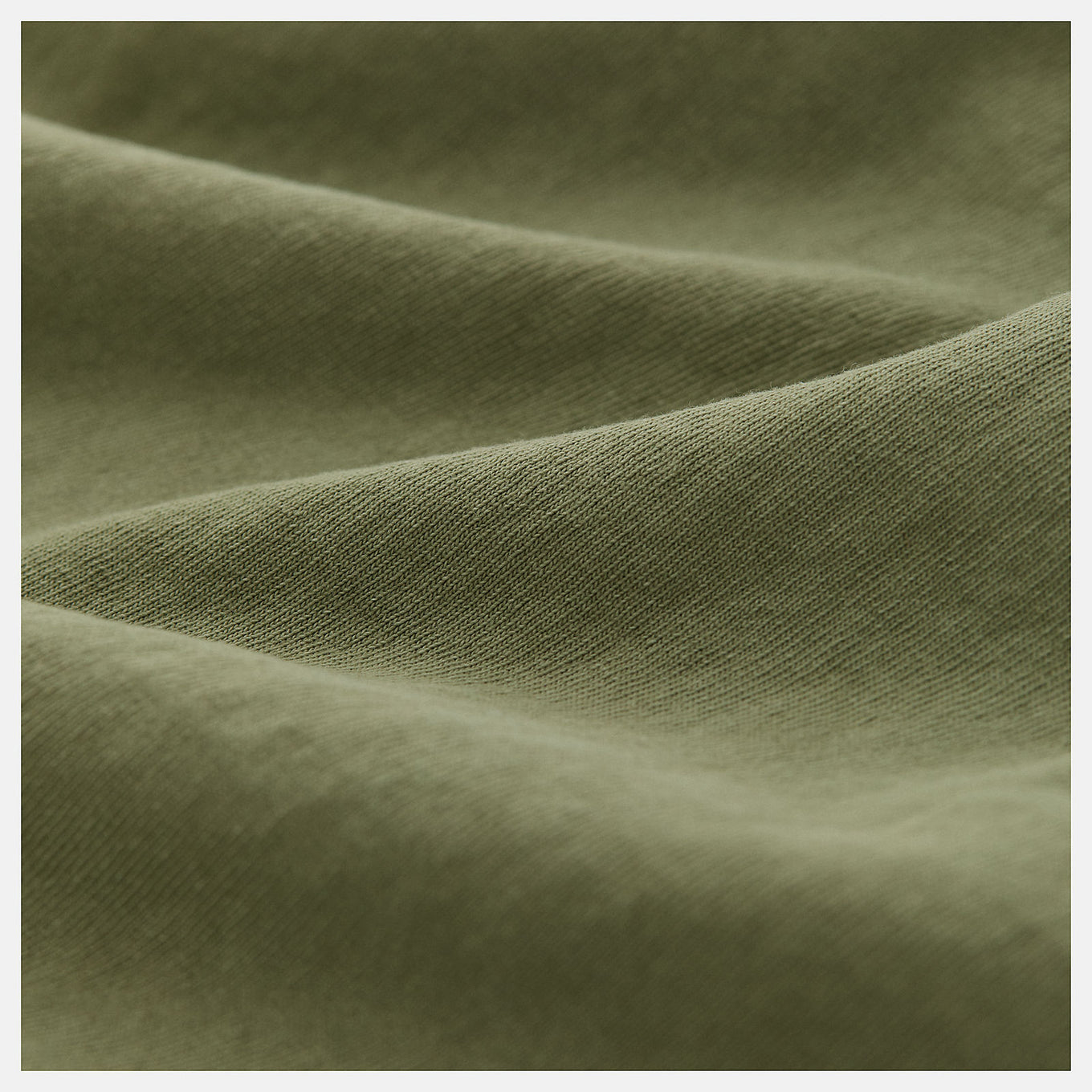 Made in USA Washed Short Sleeve T-Shirt with crew silhouette, embroidered patch logo, and vintage-inspired dyed wash treatment.