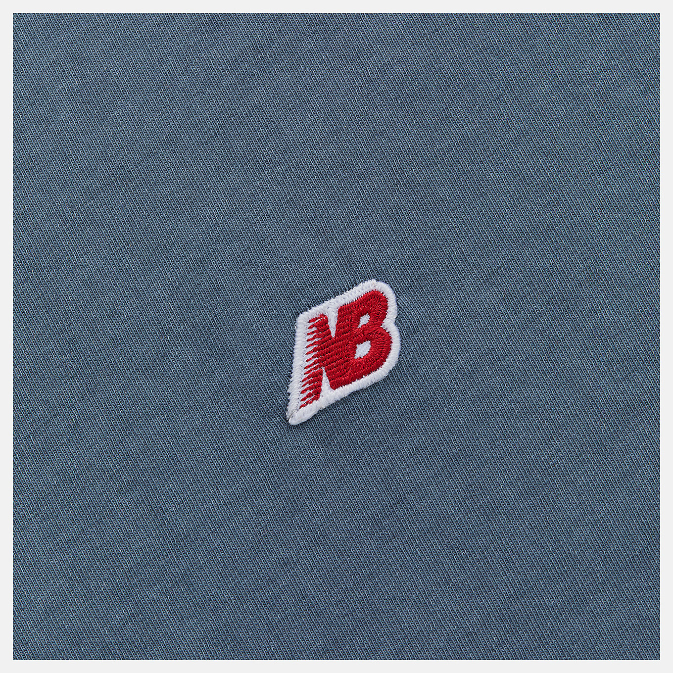 Made in USA Washed Short Sleeve T-Shirt with crew silhouette, embroidered patch logo, and vintage-inspired dyed wash treatment.