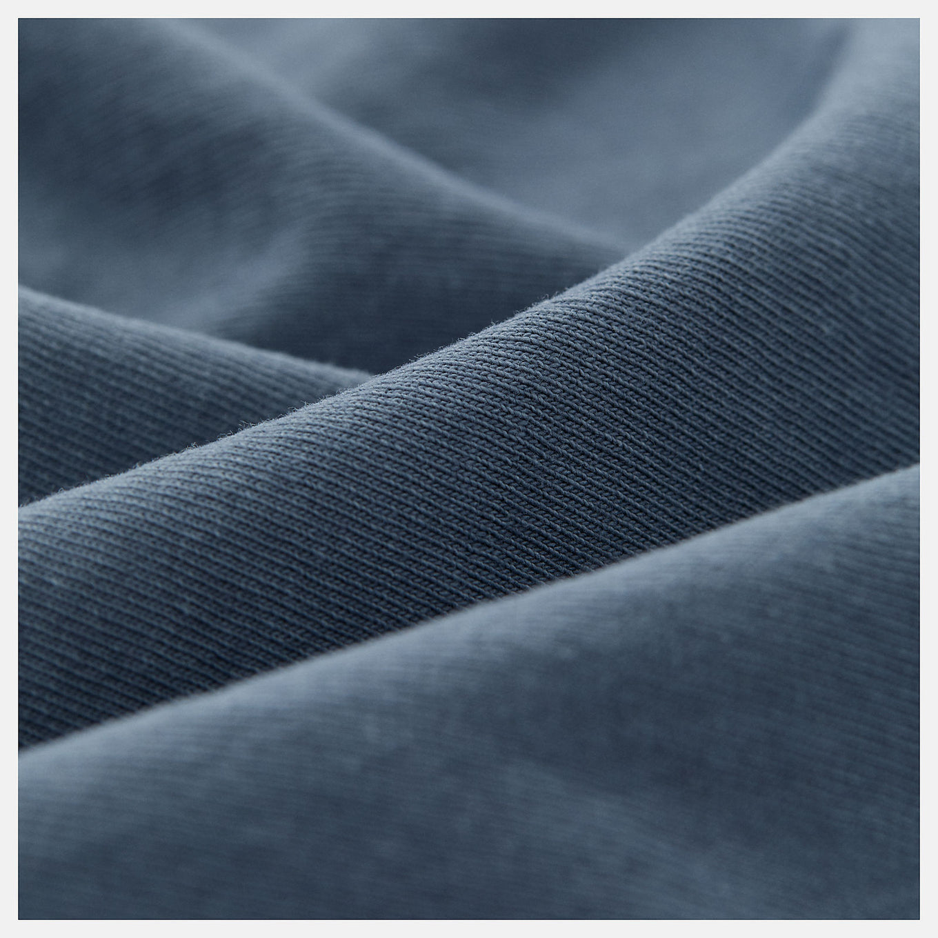 Made in USA Washed Short Sleeve T-Shirt with crew silhouette, embroidered patch logo, and vintage-inspired dyed wash treatment.