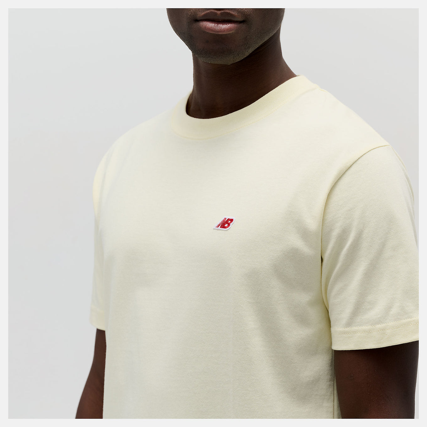 MADE in USA Core T-Shirt with a classic crewneck design, embroidered patch logo, and premium materials.