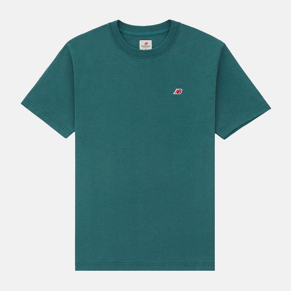 Made in USA Core T-Shirt with classic crew silhouette, embroidered patch logo, and premium materials, representing timeless quality and craftsmanship.


