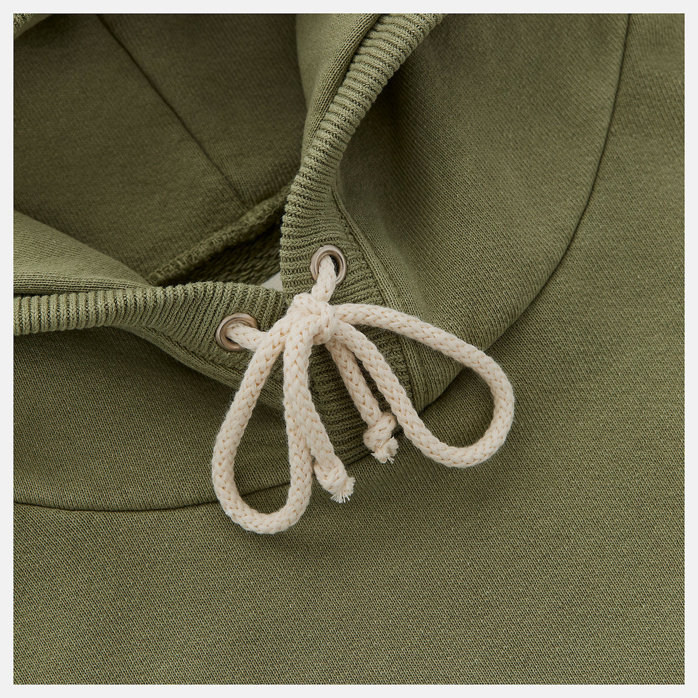 Made in USA Core Hoodie with French terry fabric, double-lined hood, embroidered patch logo, and vintage-inspired dyed wash treatment.