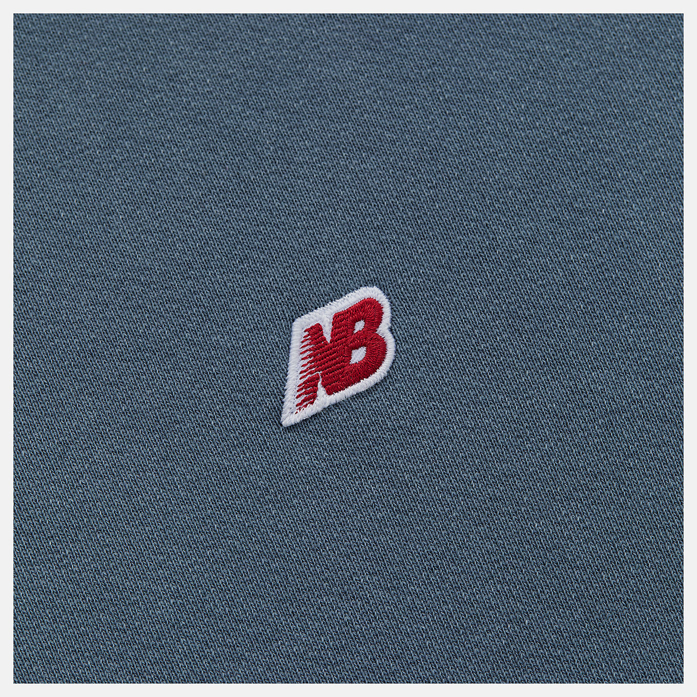 Made in USA Core Hoodie with French terry fabric, double-lined hood, embroidered patch logo, and vintage-inspired dyed wash treatment.