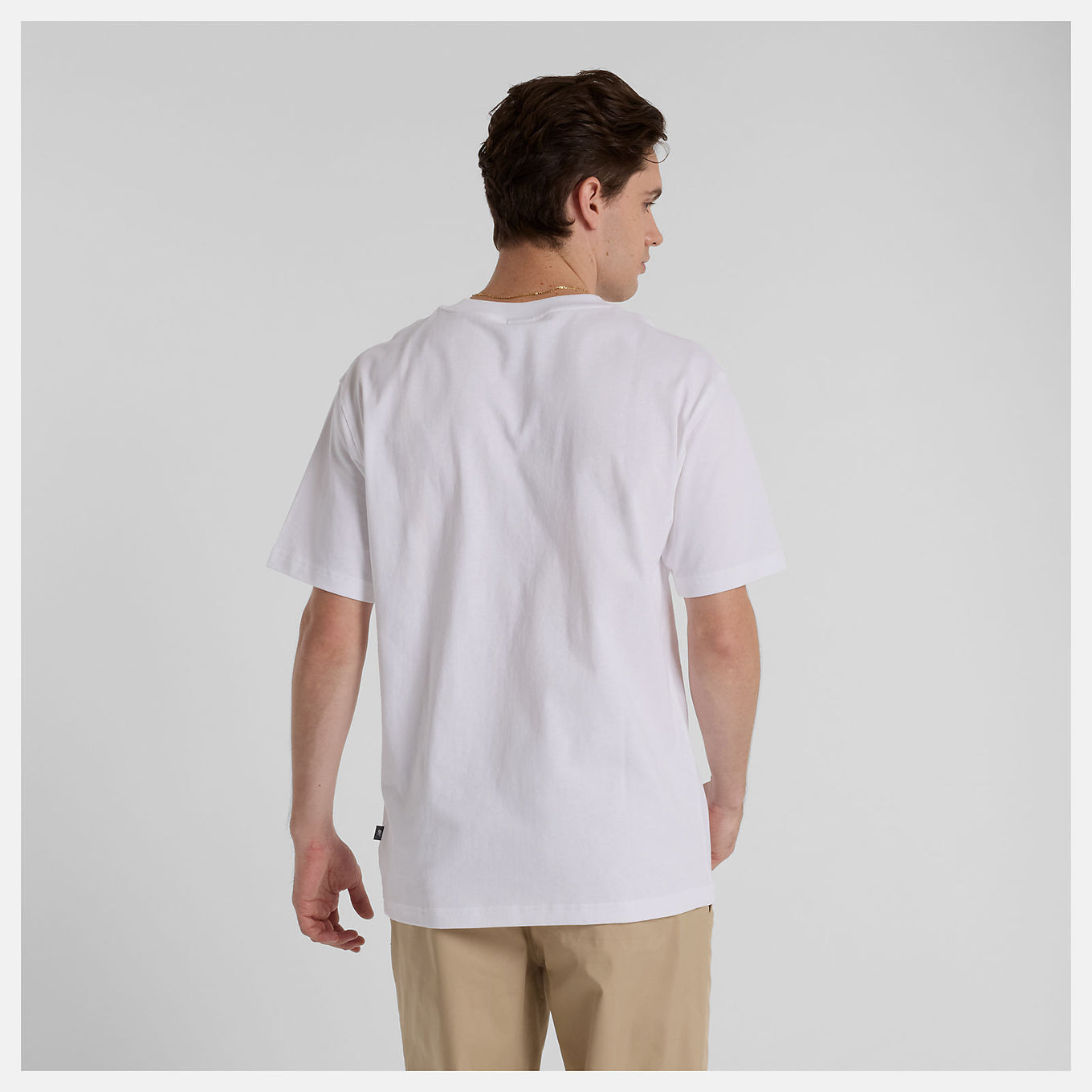 Face Oka x New Balance T-shirt featuring colorful Flying NB graphics on front and back