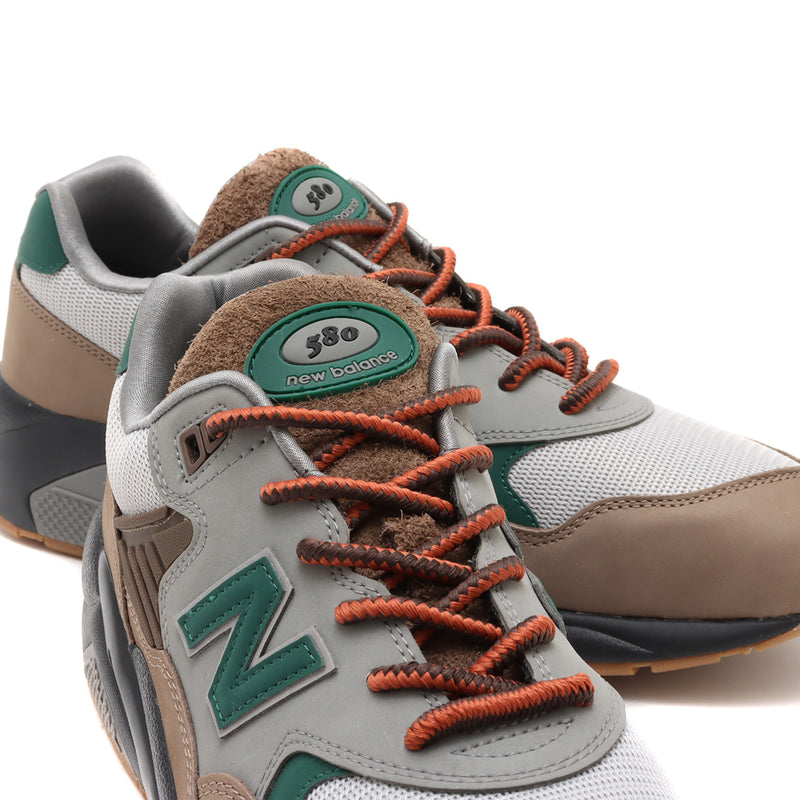 New Balance 580 trail design with sleek modern updates: suede upper, mesh collar lining