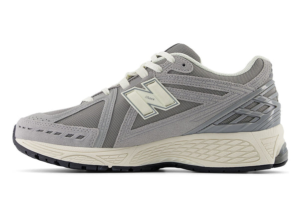 New Balance M1906U shoes with mesh and leather upper, featuring N-Durance rubber sole, N-Ergy cushioning, and Stability Web support.


