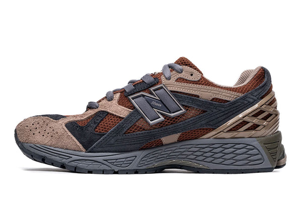 New Balance M1906U shoes with mesh and leather upper, featuring N-Durance rubber sole, N-Ergy cushioning, and Stability Web support.


