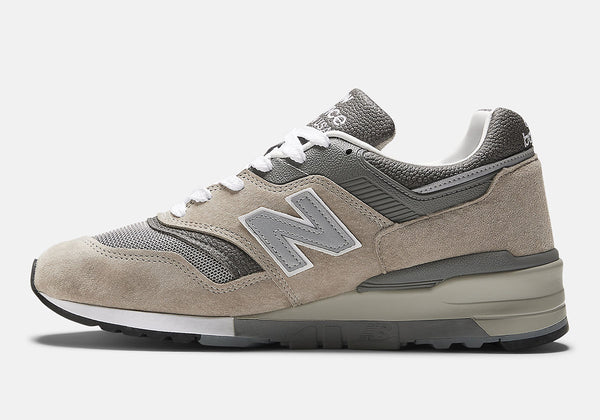 New Balance 997 'Grey' sneaker showcasing its mesh base, suede overlays, and textured leather, featuring ABZORB and ENCAP cushioning for enhanced comfort.