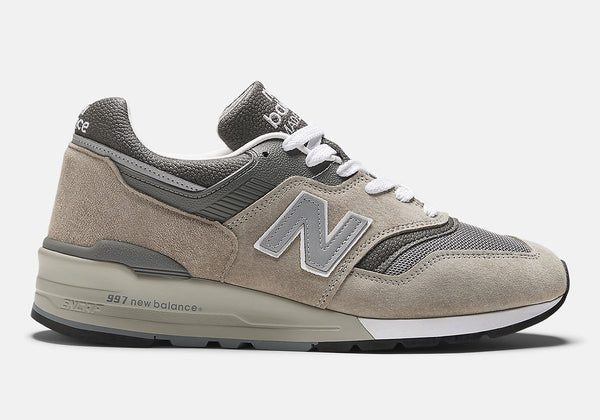 New Balance 997 'Grey' sneaker showcasing its mesh base, suede overlays, and textured leather, featuring ABZORB and ENCAP cushioning for enhanced comfort.