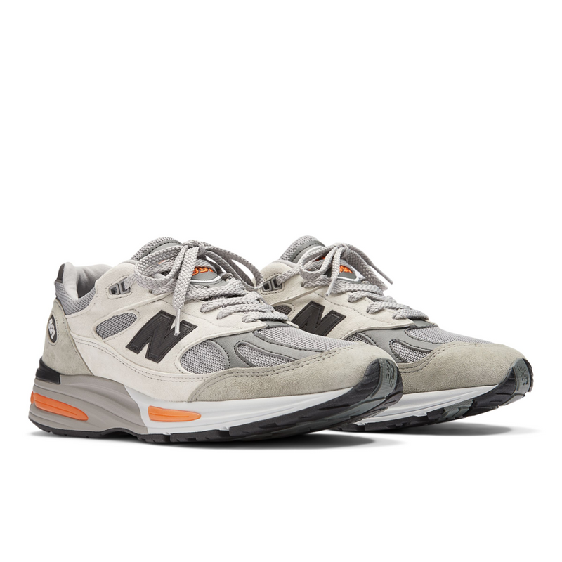 New Balance Made in USA 990v6 sneaker with a streamlined suede and mesh upper, FuelCell cushioning, and a modern grey colorway.