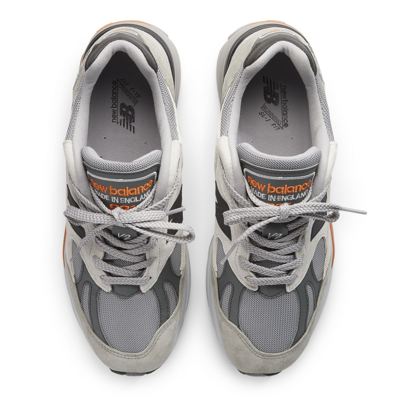 New Balance Made in USA 990v6 sneaker with a streamlined suede and mesh upper, FuelCell cushioning, and a modern grey colorway.