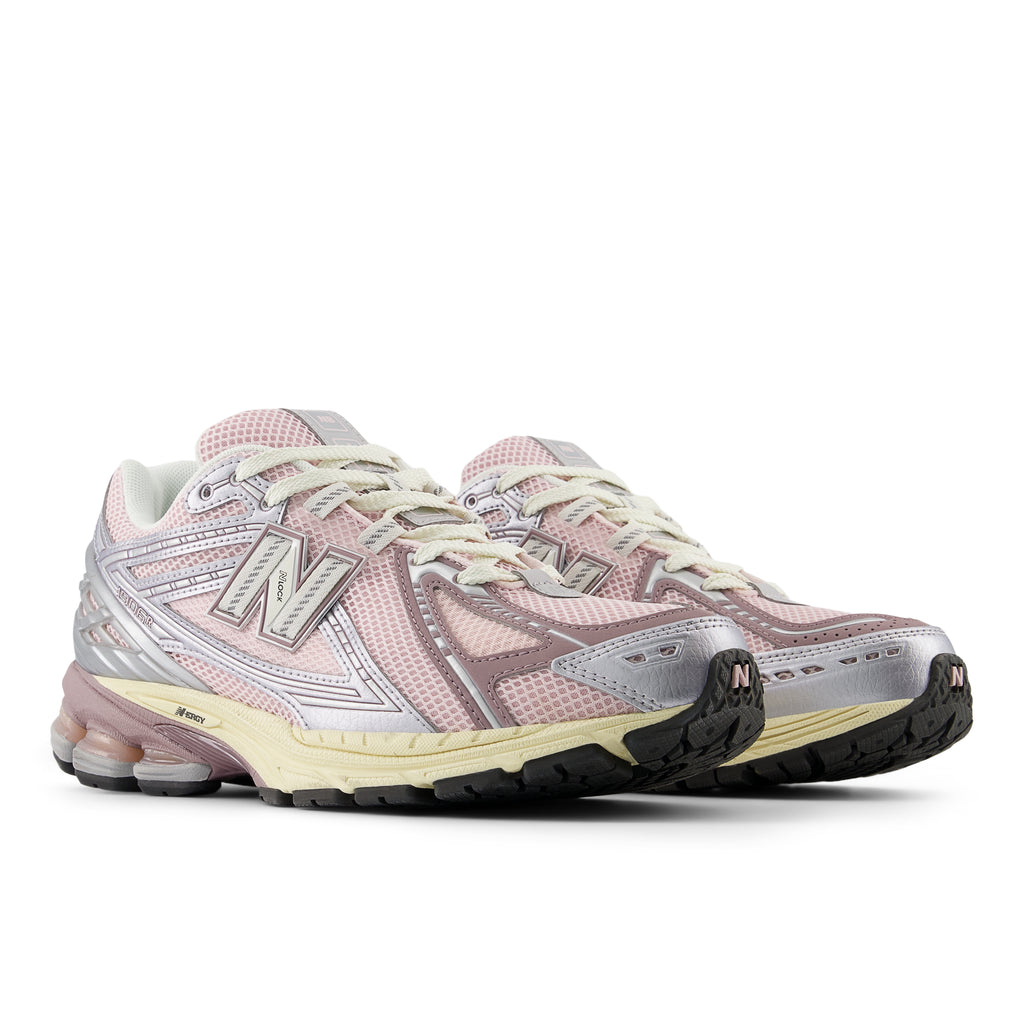 New Balance 1906R sneakers featuring a sleek design with premium mesh and synthetic overlays