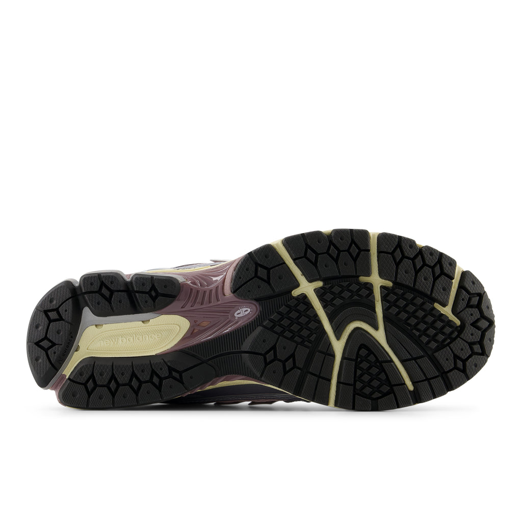 New Balance 1906R sneakers featuring a sleek design with premium mesh and synthetic overlays