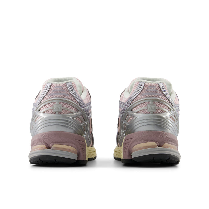 New Balance 1906R sneakers featuring a sleek design with premium mesh and synthetic overlays