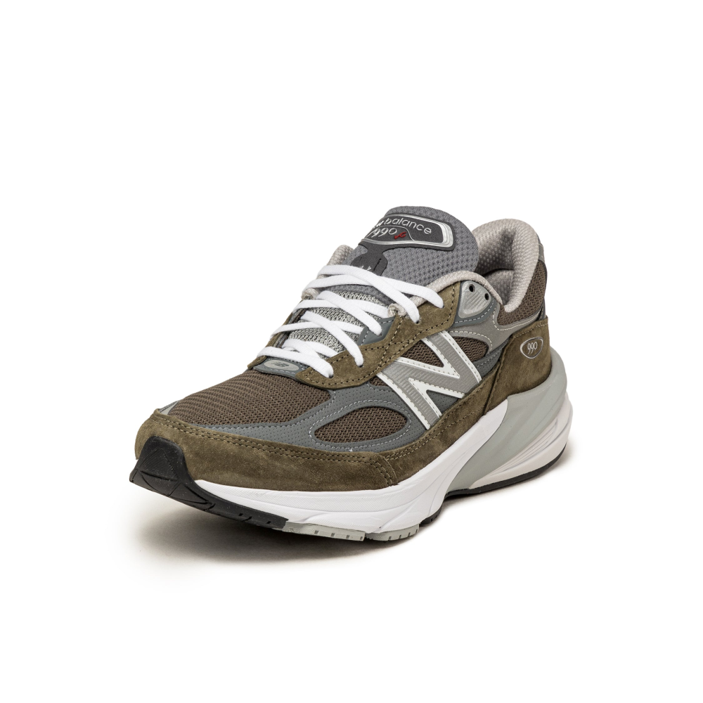 New Balance Made in USA 990v6 sneaker with a streamlined suede and mesh upper, FuelCell cushioning, and a modern grey colorway.