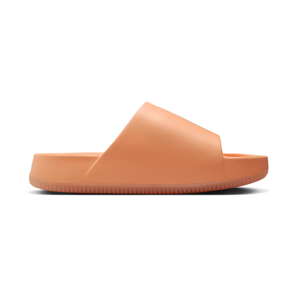 Lightweight foam slides with a minimalist design, featuring a smooth, seamless fit and textured footbed for grip, perfect for the beach, pool, or city.