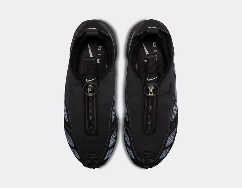 Air Max SNDR sneaker with a bold design featuring Silver accents, a black zip-up shroud, reflective design panels, Max Air cushioning in the heel, and Nike Air in the forefoot. Unzipped shroud reveals ""6453"" representing Nike’s global office numbers.